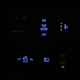 Mirror controls (top left) are not backlit at night, for whatever reason